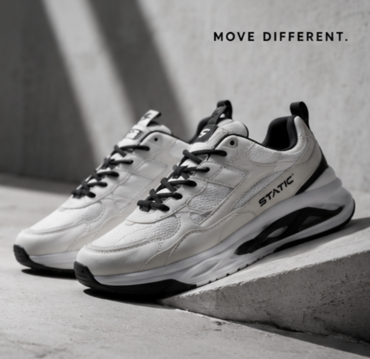 STATIC sneakers on concrete steps — Move Different campaign